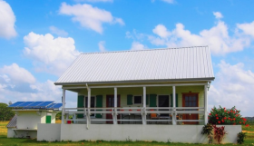 House with solar collector in Carmelita Gardens, Belize – Best Places In The World To Retire – International Living